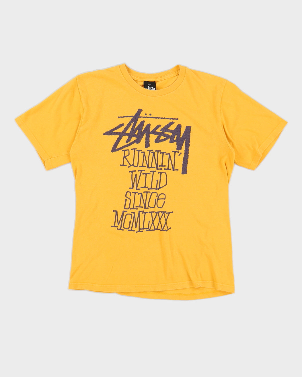 T shirt Stussy jaune runnin wild depuis mcmlxxx s Rokit